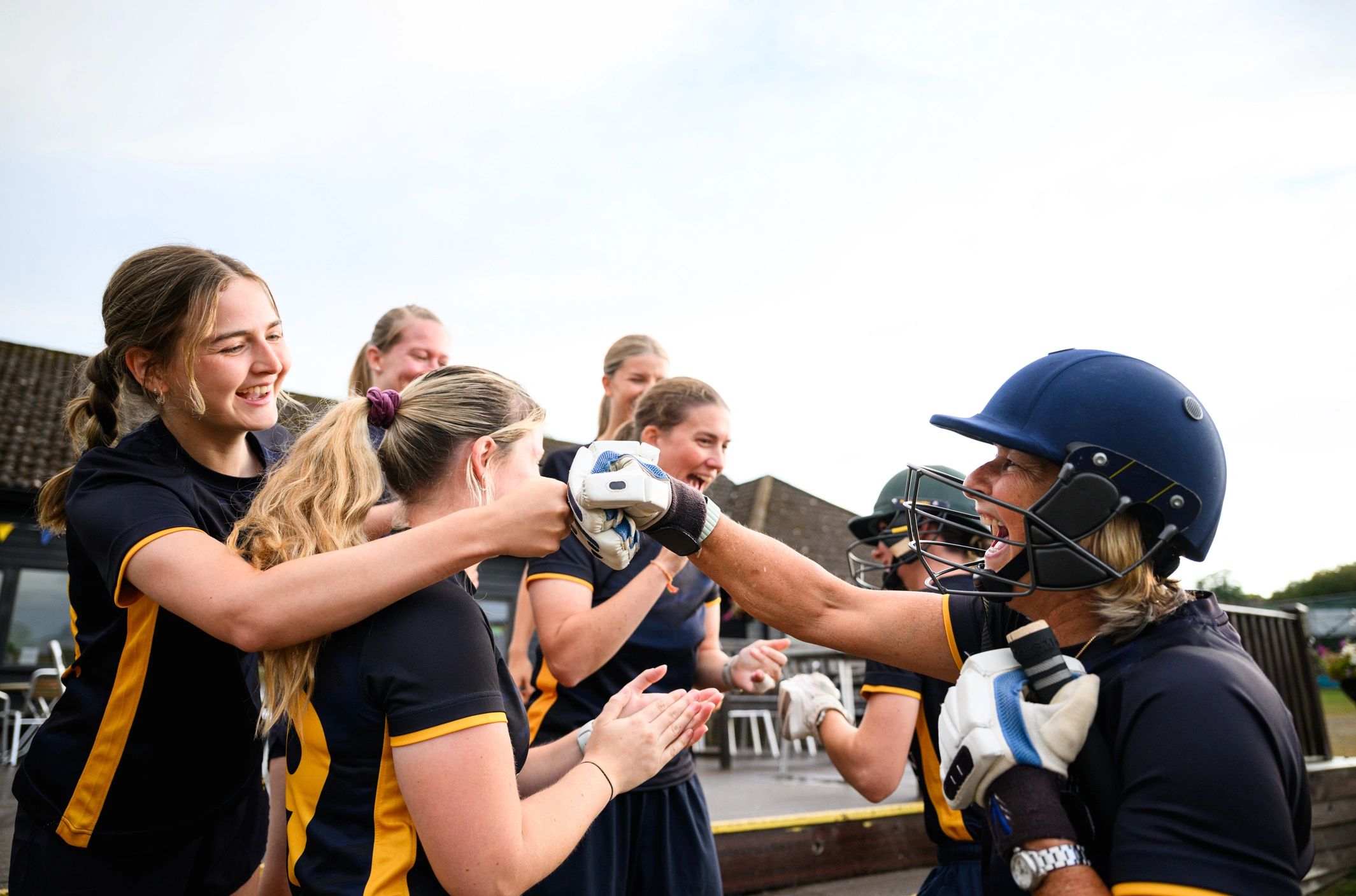 Cricket team celebrating a win